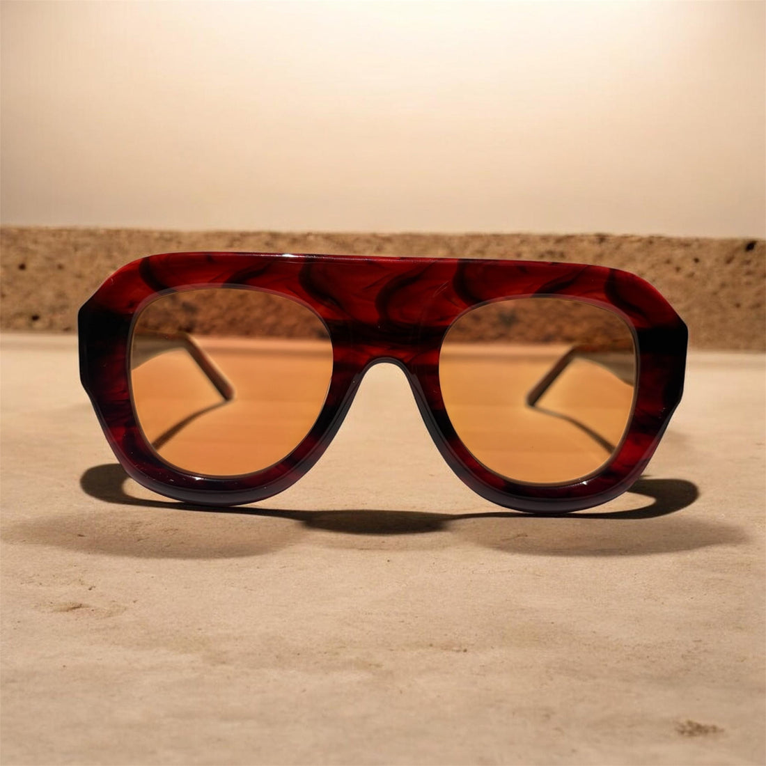 vibrant red aviator sunglasses with yellow tint lenses