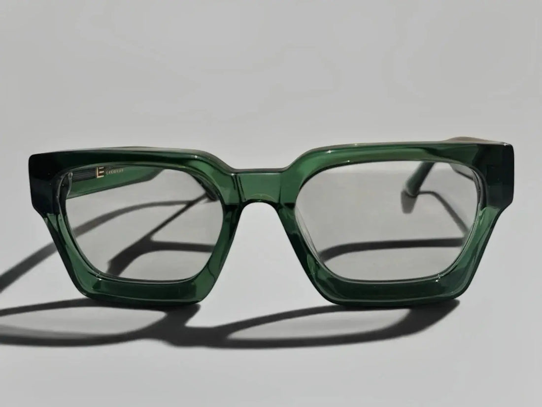 Liberated Eyewear, Inc. Jade rectangular glasses featuring a translucent green handcrafted acetate frame.