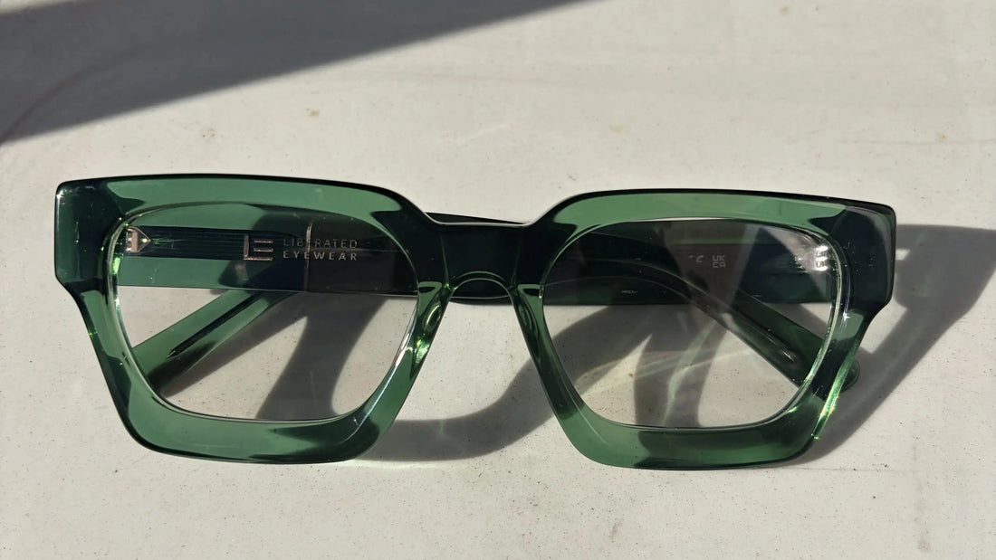 Liberated Eyewear, Inc. Jade rectangular glasses in translucent green acetate with a bold, modern frame design.