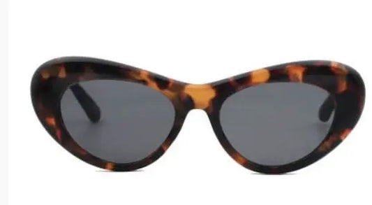 The Avenue - Liberated Eyewear, Inc. designer polycarbonate round sunglasses for women