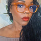 Underline - Liberated Eyewear, Inc. beautiful black woman in orange acetate eyeglasses in single vision